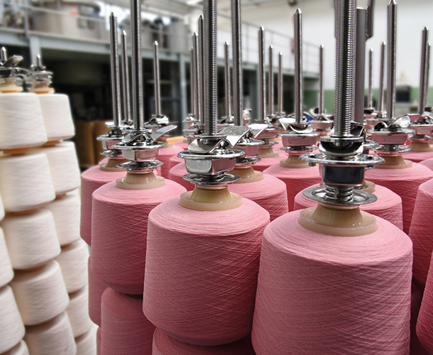 The plastic bobbin allows for evenly dyed yarns like this batch.